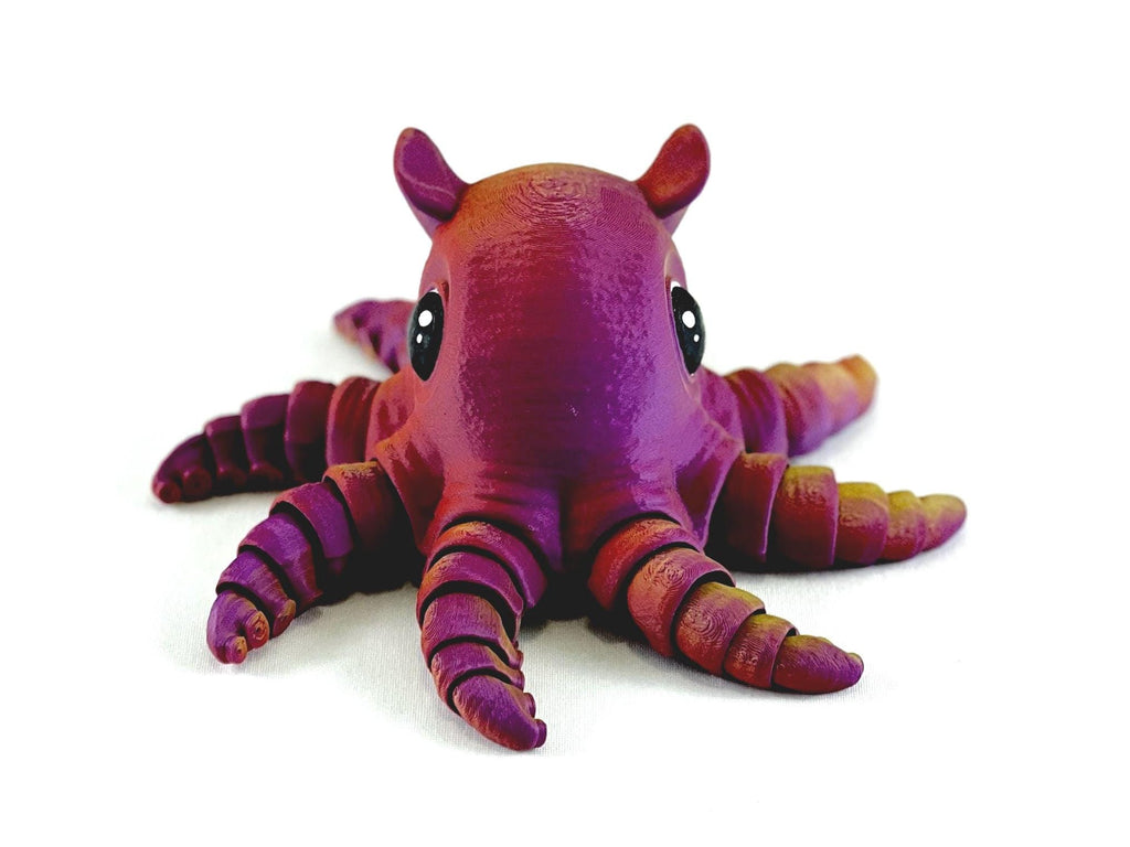 Articulated Dumbo Octopus: Eco-Friendly Fidget Toy and Octopus present