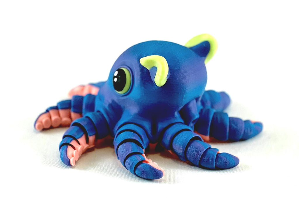 Articulated Dumbo Octopus: Eco-Friendly Fidget Toy and Octopus present